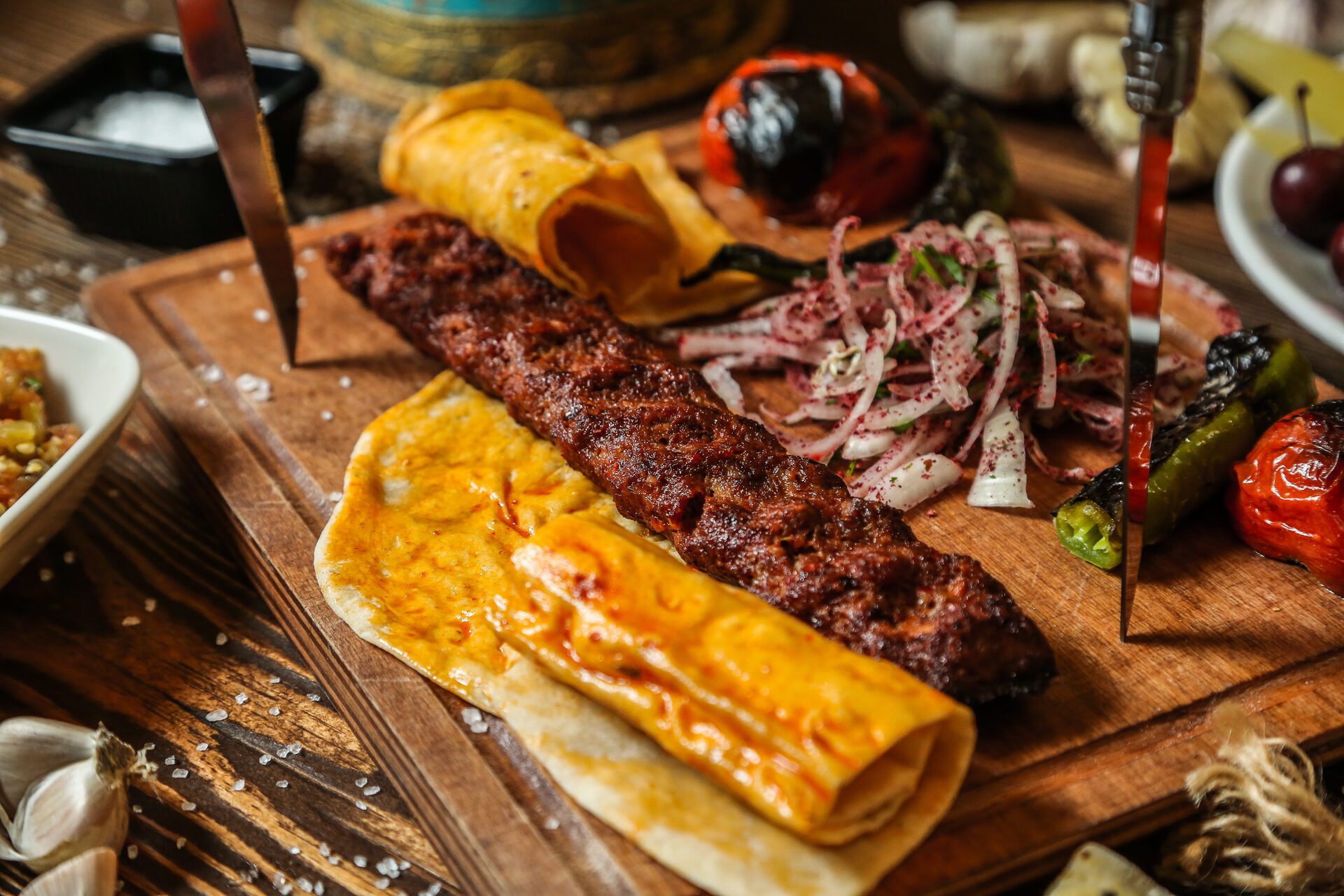 Adana kebab on wooden board